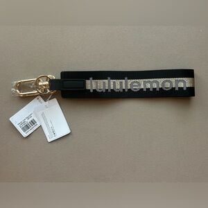Lululemon never lost keychain, new with tags